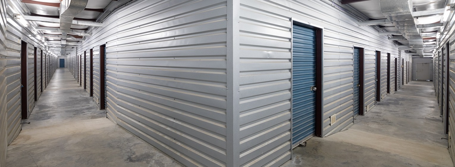 View of interior hallways of climate controlled storage units at Joey's Self Storage in Waxahachie, TX