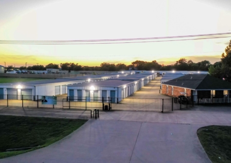 Evening wide view of front of Joey's Self Storage in Waxahachie, TX