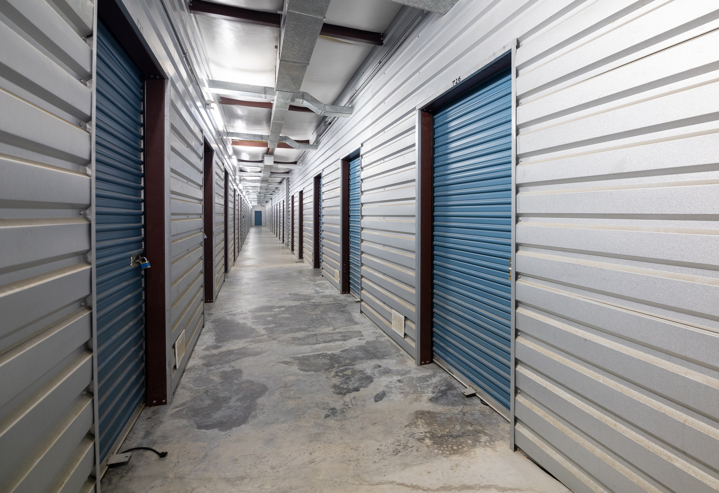 Interior hallway view of climate controlled units at Joey's Self Storage in Waxahachie, TX